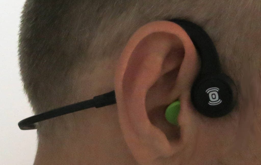 wearing earplugs with bone conduction headphones