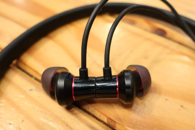 ANC Pro earbuds clasp together with magents