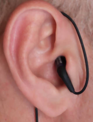 Etymotic cable lead over the ears